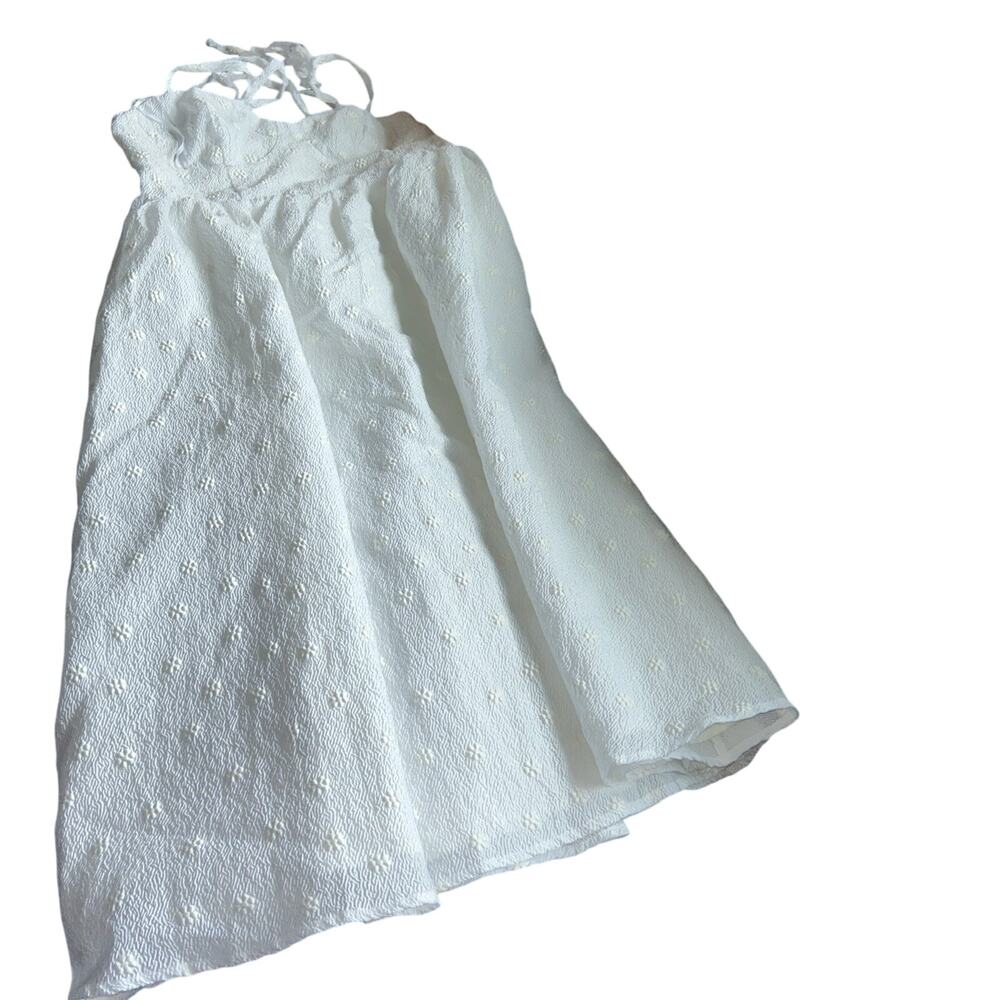 White women’s sundress with Tie spaghetti straps brand is Lulu’s